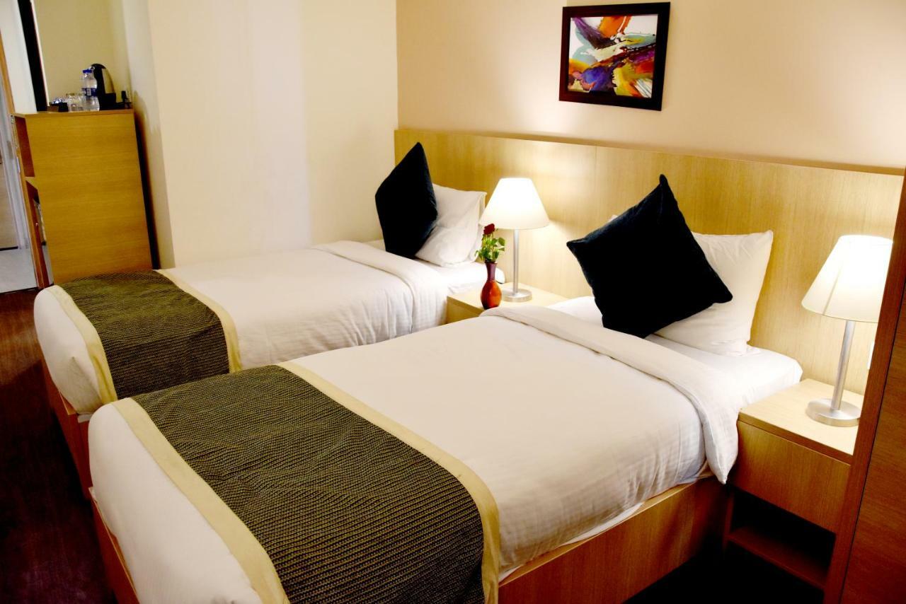 Starlit Suites Нимрана Экстерьер фото